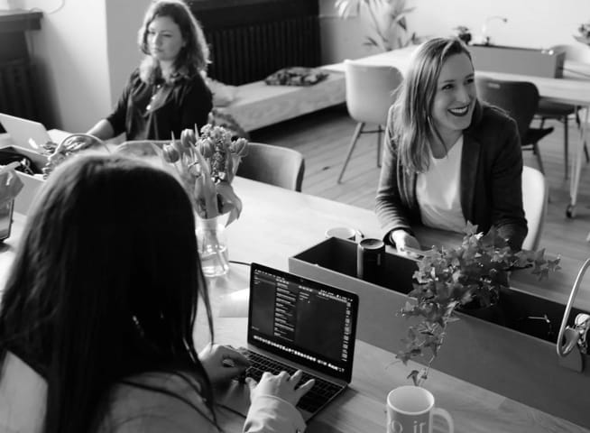 girl coding in her laptop